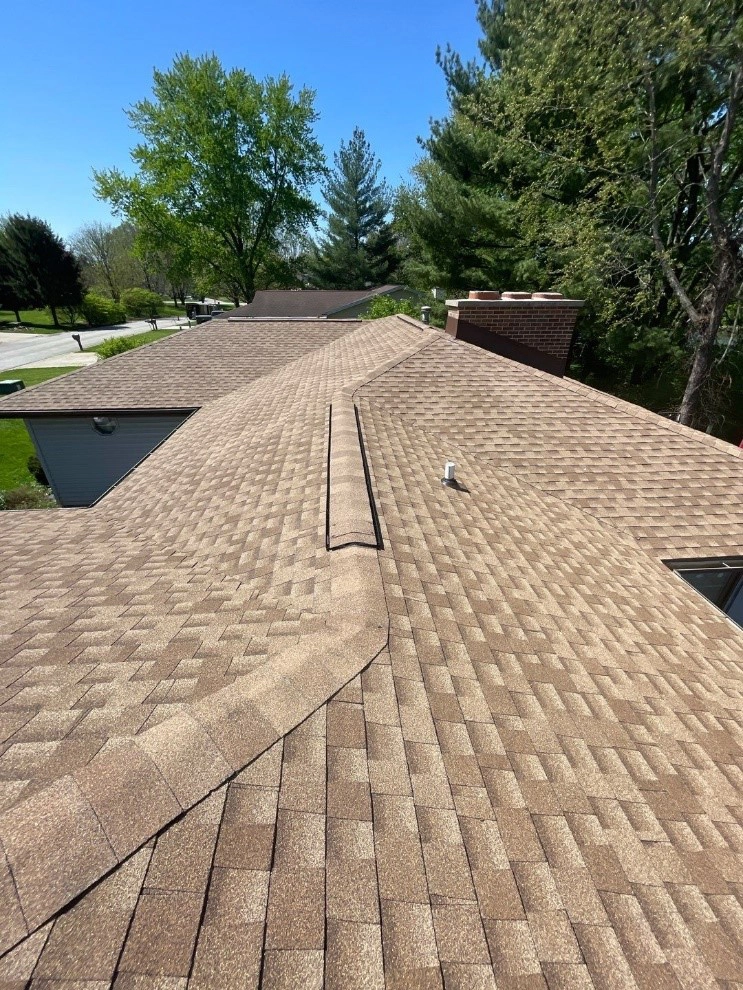 This is a picture of a newly installed roof by Sutton's.