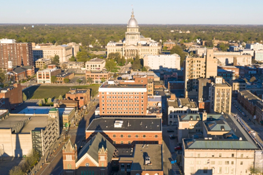 This is a photo of a part of downtown Springfield, IL, with the Illinois State Capital in the background.