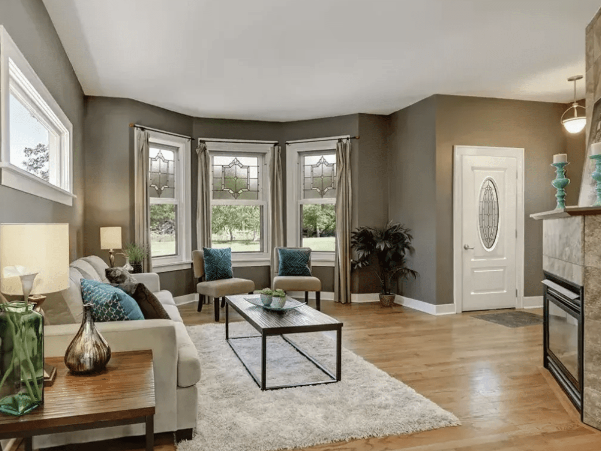 Interior view of a home featuring one ProVia awning window and three double-hung windows near the front door – available from Sutton’s in Springfield IL